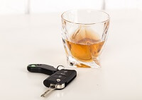 Alcohol and keys on a table - DWI
